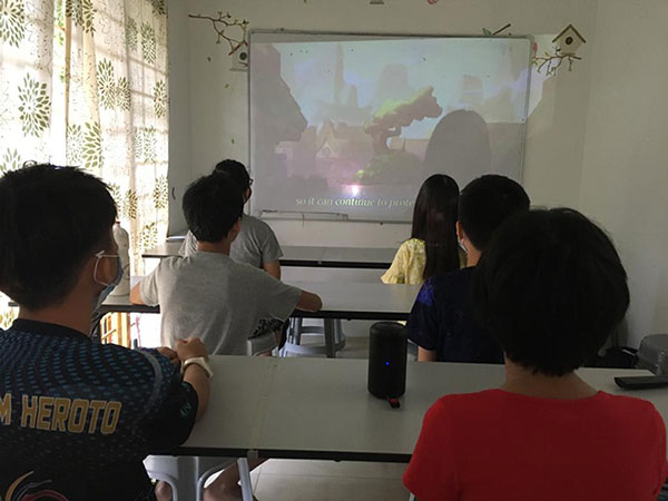 Kids at Apple Tree, Penang, watching a video about the Monkey King